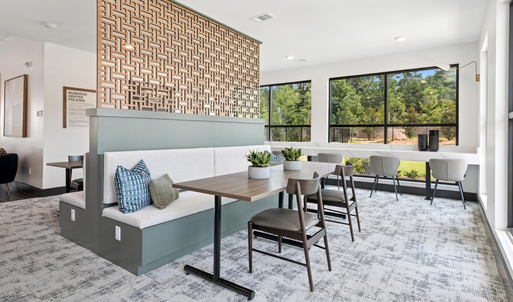 a room with a table and chairs